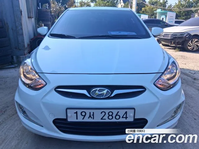 Hyundai Accent 2014 — фото 1
