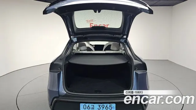 Tesla Model Y 2025 — фото 20