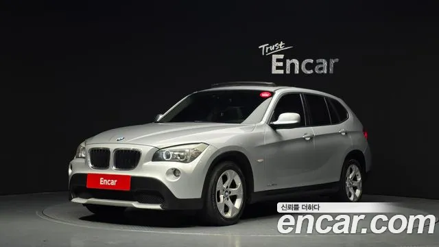 BMW X1 2010 — фото 1