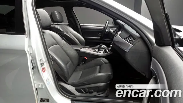 BMW 5-Series 2011 — фото 11