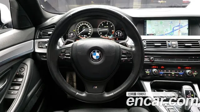 BMW 5-Series 2011 — фото 13