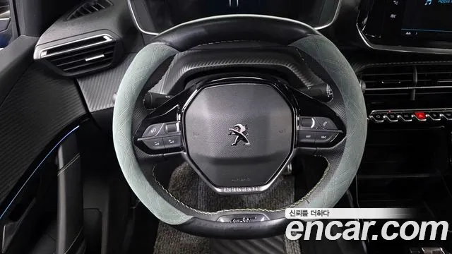 Peugeot 208 2023 — фото 14