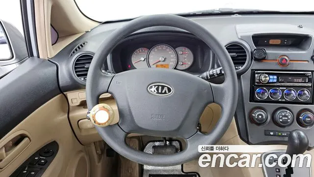 Kia Carens 2007 — фото 13