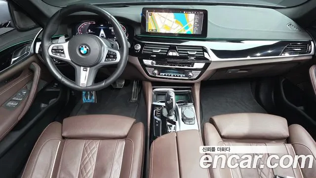 BMW 5-Series 2023 — фото 10