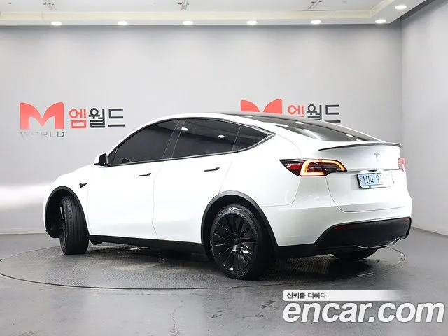 Tesla Model Y 2023 — фото 4