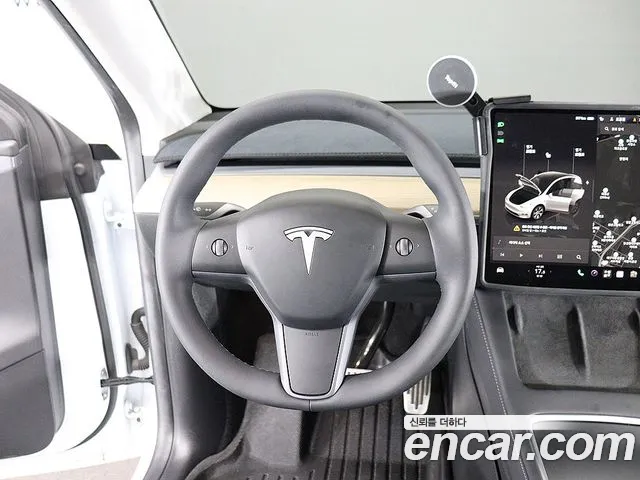 Tesla Model Y 2023 — фото 16