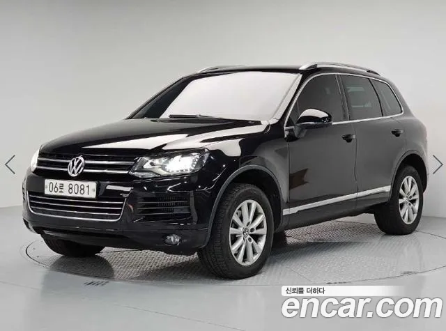 Volkswagen Touareg 2014 — фото 1