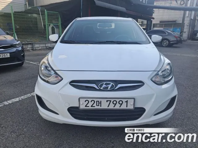 Hyundai Accent 2015 — фото 1