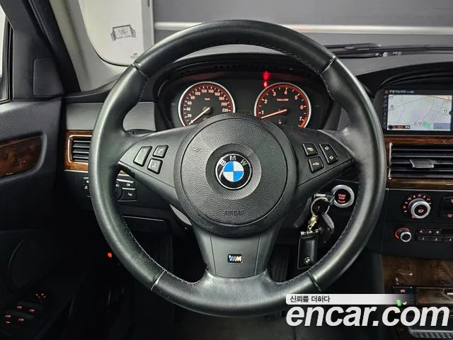BMW 5-Series 2010 — фото 13