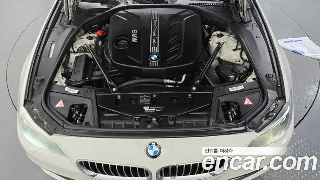BMW 5-Series 2014 — фото 18