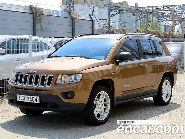 Jeep Compass 2011 — фото 2