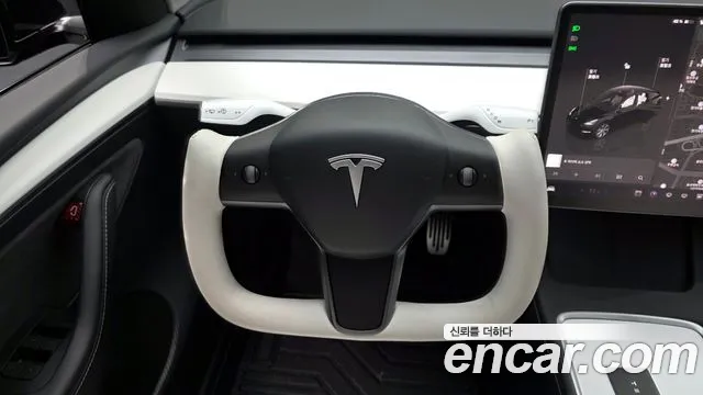 Tesla Model Y 2024 — фото 19