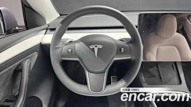 Tesla Model Y 2024 — фото 11