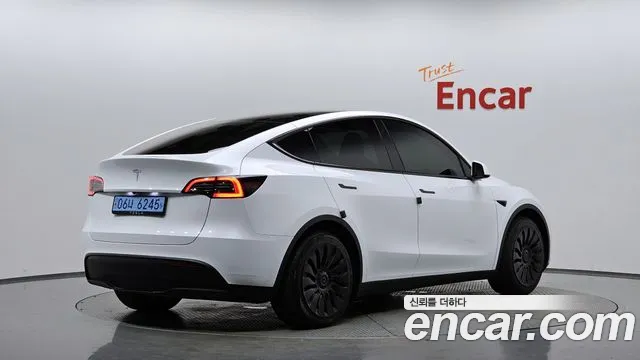 Tesla Model Y 2024 — фото 1