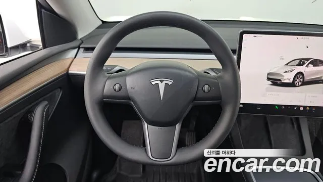 Tesla Model Y 2024 — фото 18