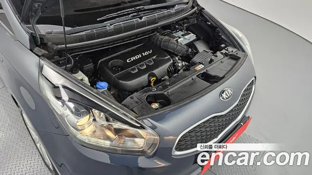 Kia Carens 2015 — фото 6