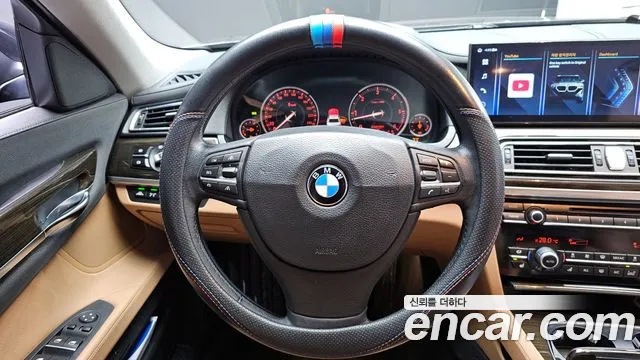 BMW 7-Series 2013 — фото 12