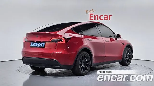 Tesla Model Y 2024 — фото 2