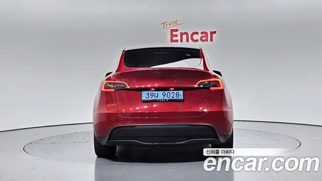 Tesla Model Y 2024 — фото 4