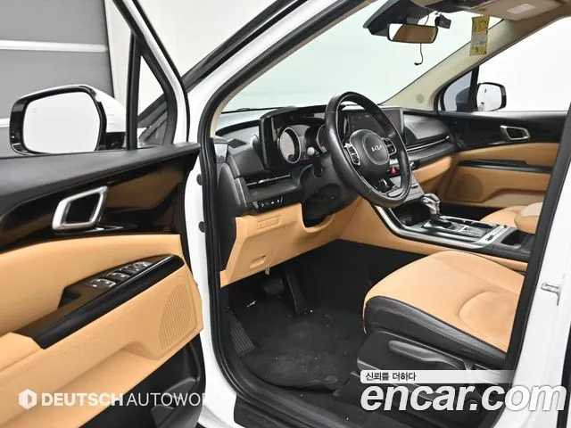 Kia Canival 2023 — фото 11