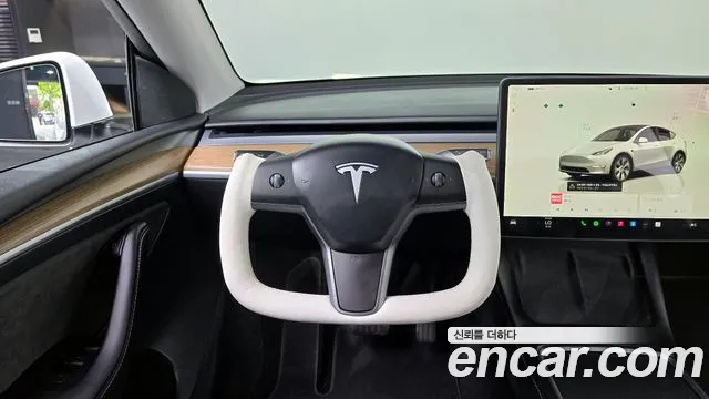 Tesla Model Y 2024 — фото 17