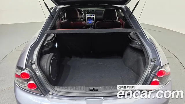 Hyundai Tuscani 2007 — фото 20