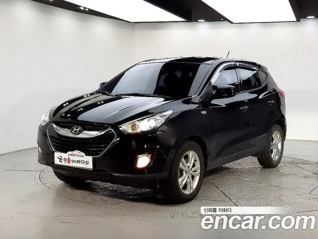 Hyundai Tucson 2012 — фото 1