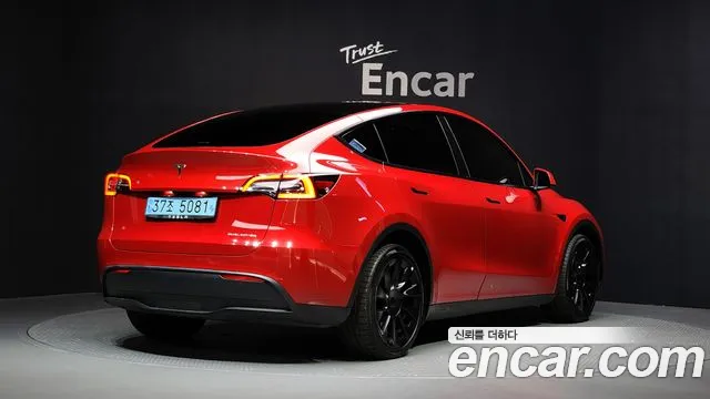 Tesla Model Y 2023 — фото 2