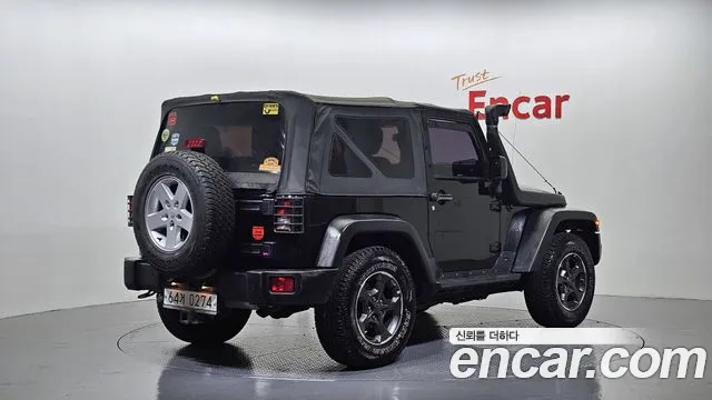 Jeep Wrangler 2012 — фото 2