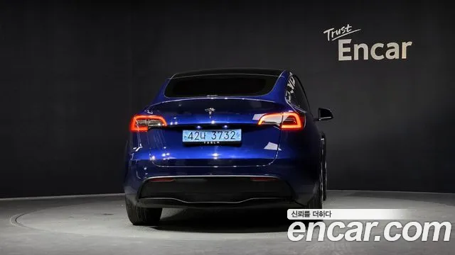Tesla Model Y 2024 — фото 4