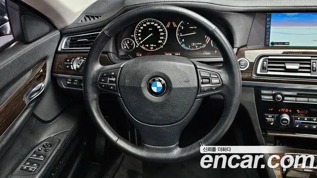 BMW 7-Series 2011 — фото 14