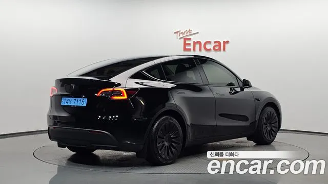 Tesla Model Y 2024 — фото 1