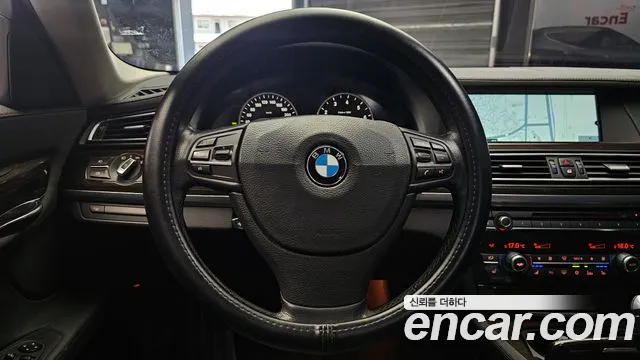 BMW 7-Series 2010 — фото 14