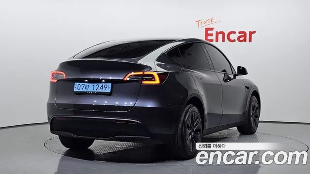 Tesla Model Y 2024 — фото 2