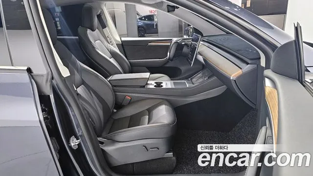 Tesla Model Y 2024 — фото 11