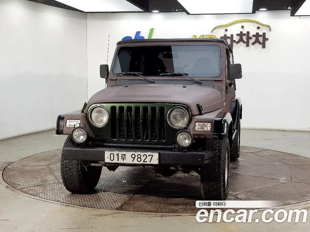 Jeep Wrangler 1997 — фото 2