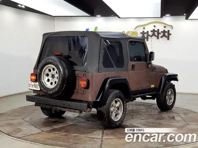 Jeep Wrangler 1997 — фото 4
