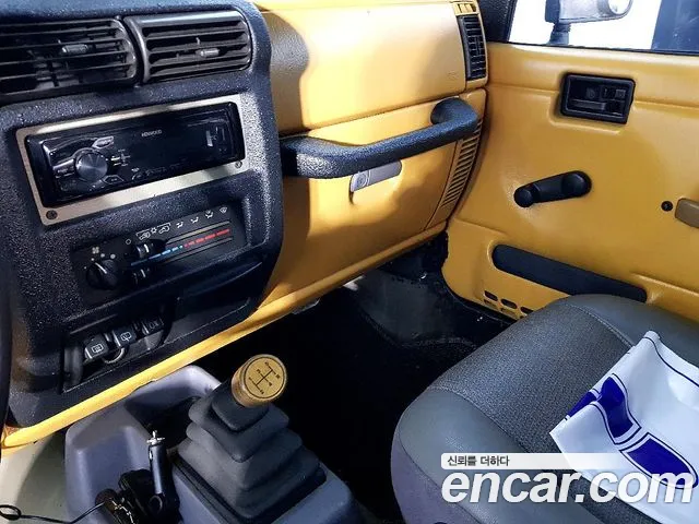 Jeep Wrangler 1997 — фото 10