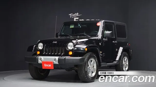 Jeep Wrangler 2009 — фото 1