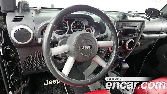 Jeep Wrangler 2009 — фото 13