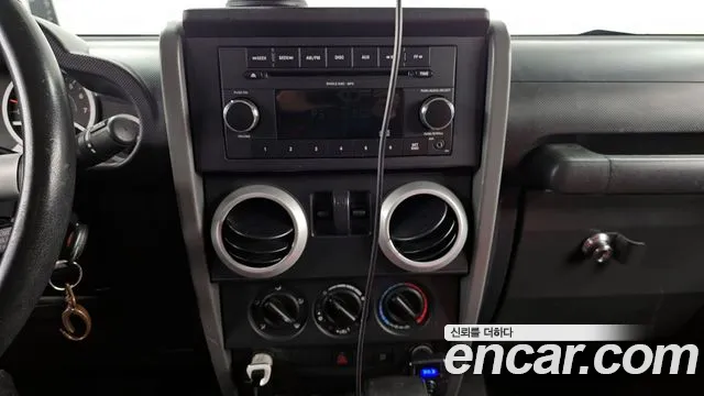 Jeep Wrangler 2009 — фото 14