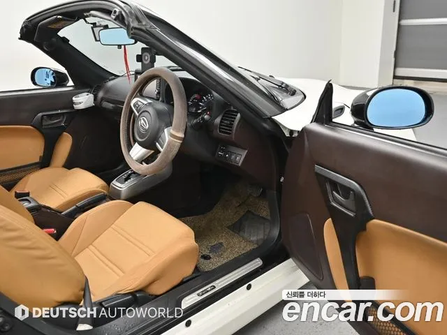 Daihatsu Copen 2015 — фото 11