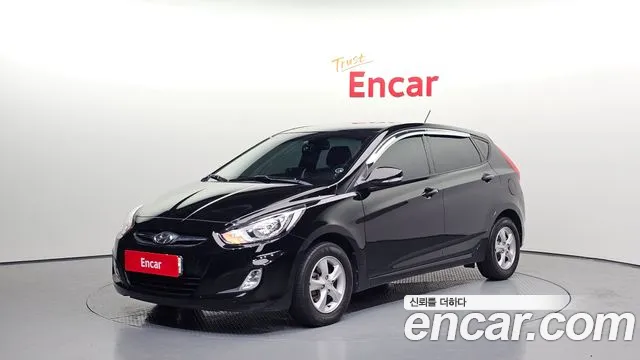 Hyundai Accent 2012 — фото 1