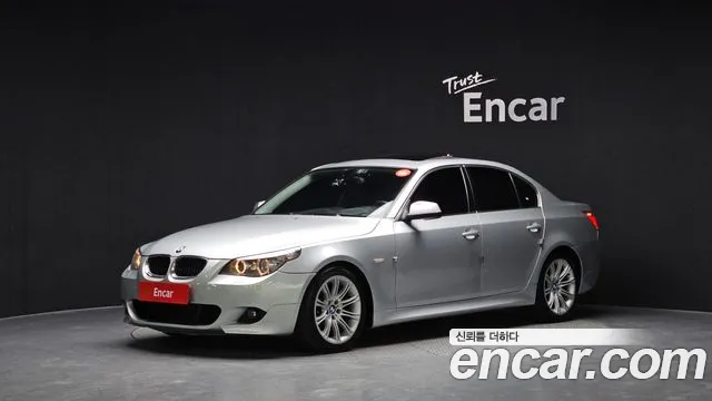 BMW 5-Series 2010 — фото 1
