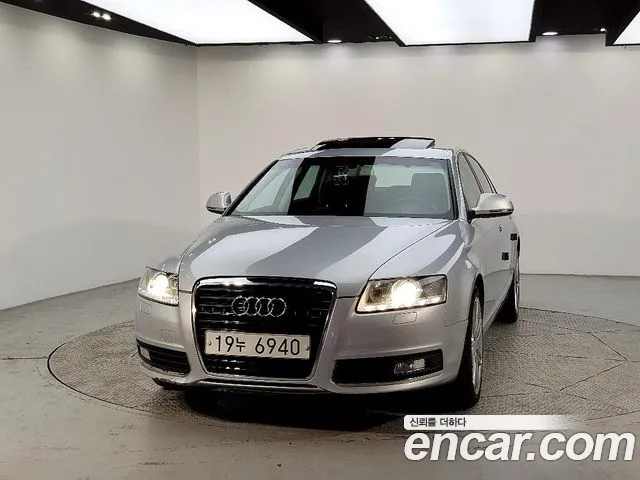 Audi A6 2010 — фото 2