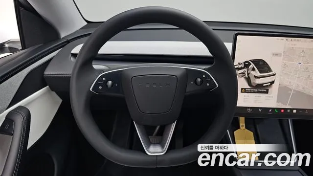 Tesla Model Y 2025 — фото 17