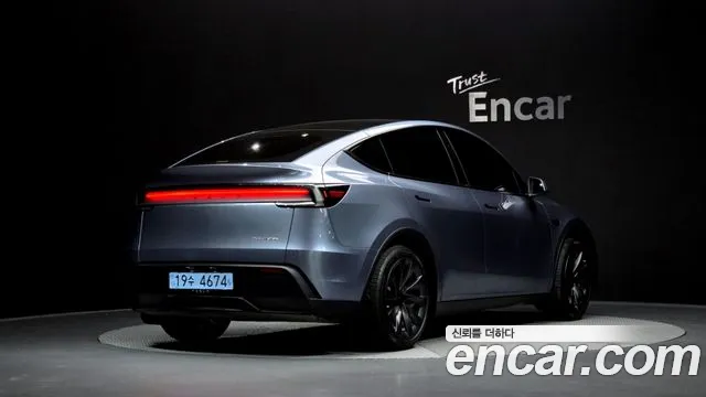 Tesla Model Y 2025 — фото 2