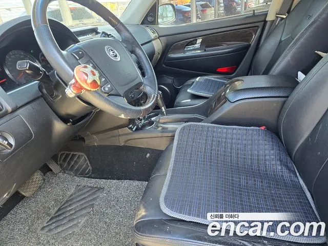 KG Mobility Rexton 2011 — фото 6