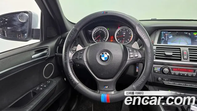 BMW X6M 2010 — фото 14