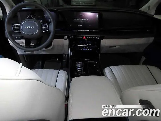 Kia Canival 2023 — фото 10